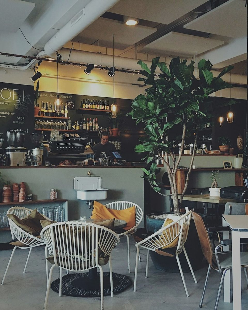 Indiranagar café table setting with filter coffee in warm ambient light